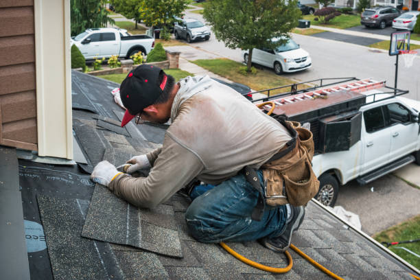Professional Flat Roof Repair technician working in Charleston, AR